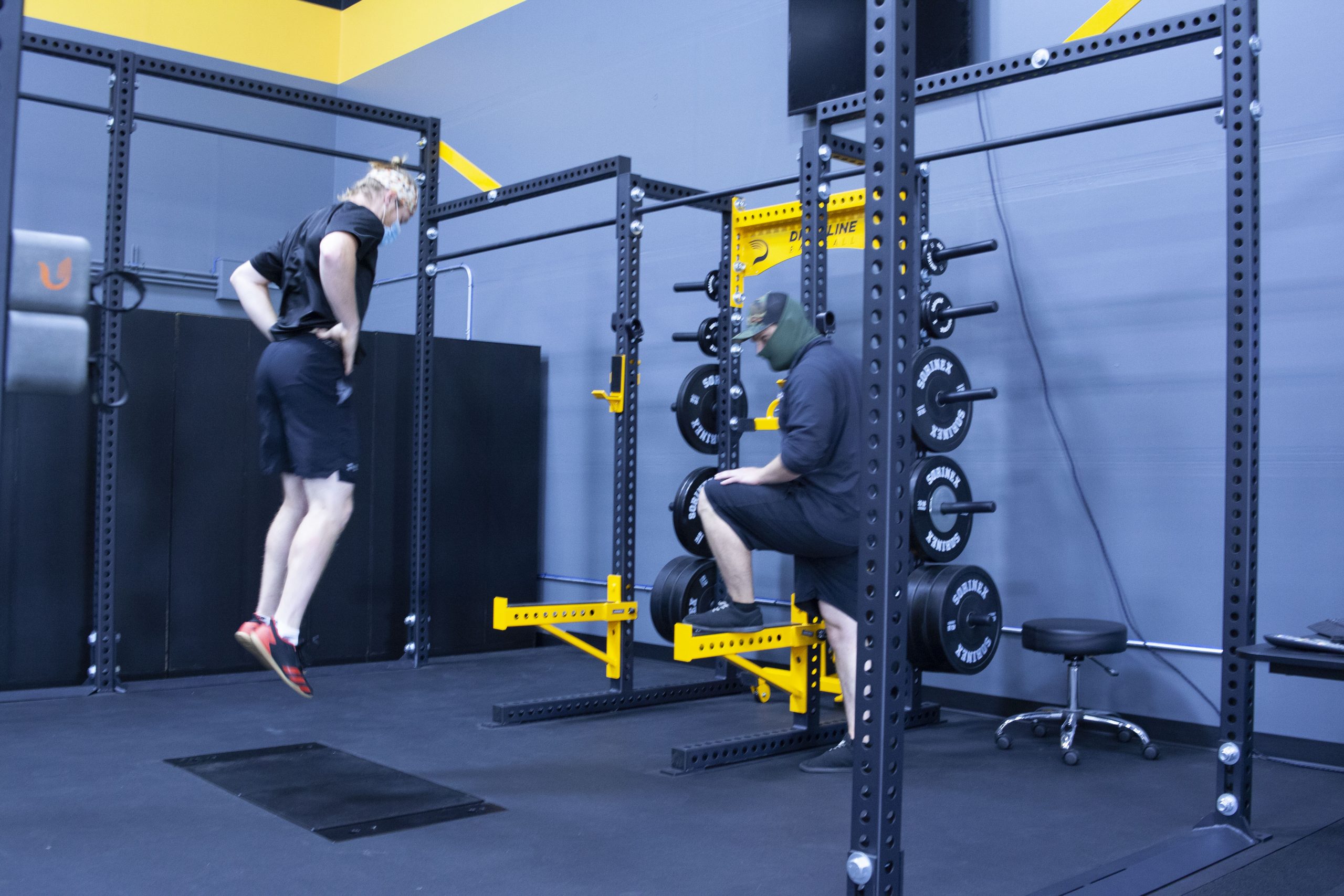 Phases of the standing broad jump: (A) start of takeoff phase, (B)